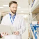 Technical engineer preparing medical goods for export in a modern distribution facility.