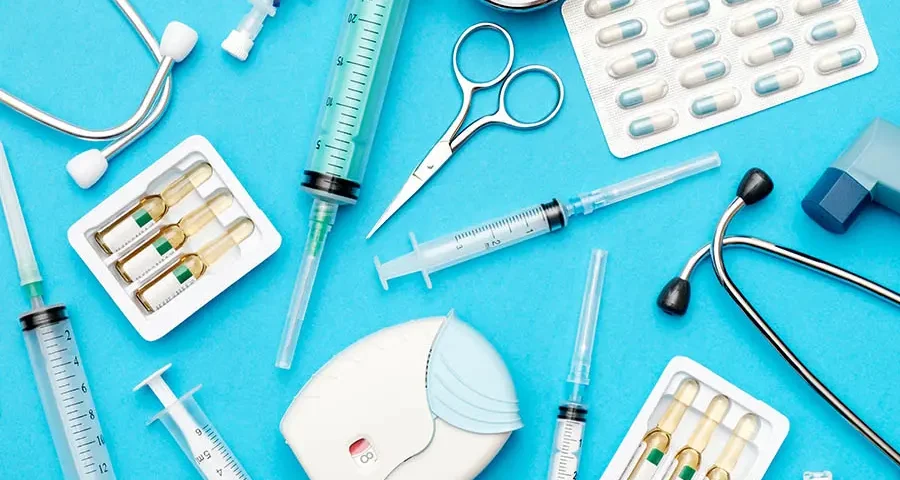 In-date medical tools neatly displayed on a colorful background.
