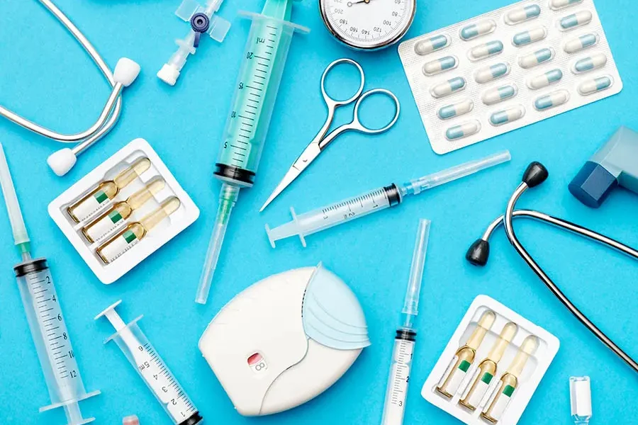 In-date medical tools neatly displayed on a colorful background.