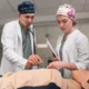 Medical student practicing in a hospital as part of their clinical education.