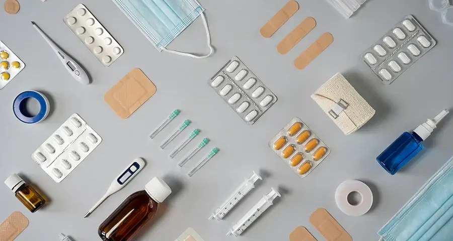 Top view of organized medicine supplies, useful for illustrating inventory or soon-to-expire materials.